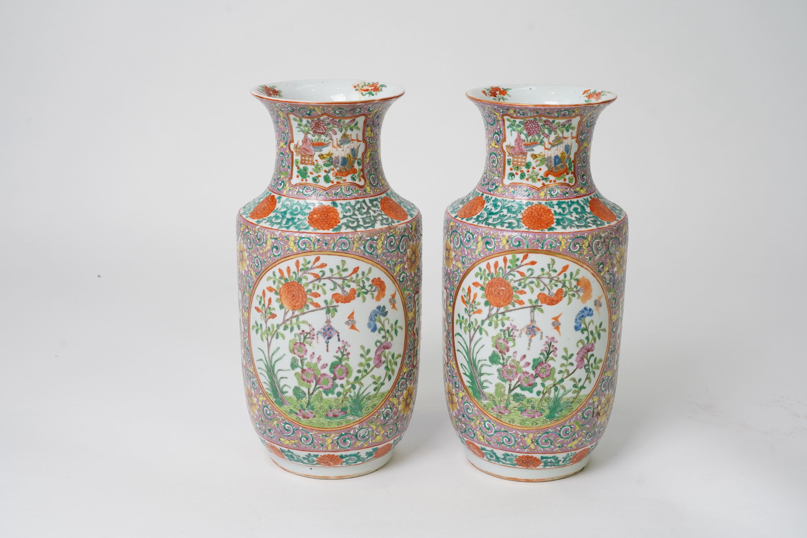 A pair of Chinese famille rose vases, early 20th century